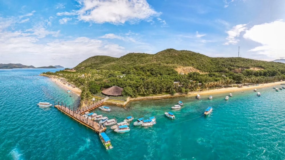 The island retains its pristine charm with lush tropical forests interwoven with coconut groves